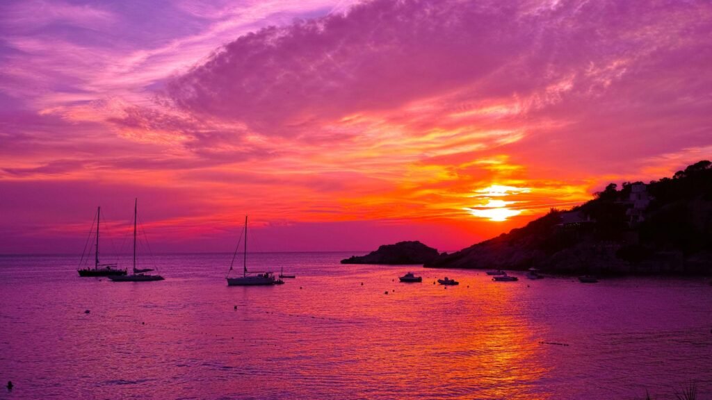Luxury catamarans at the sunset in ibiza